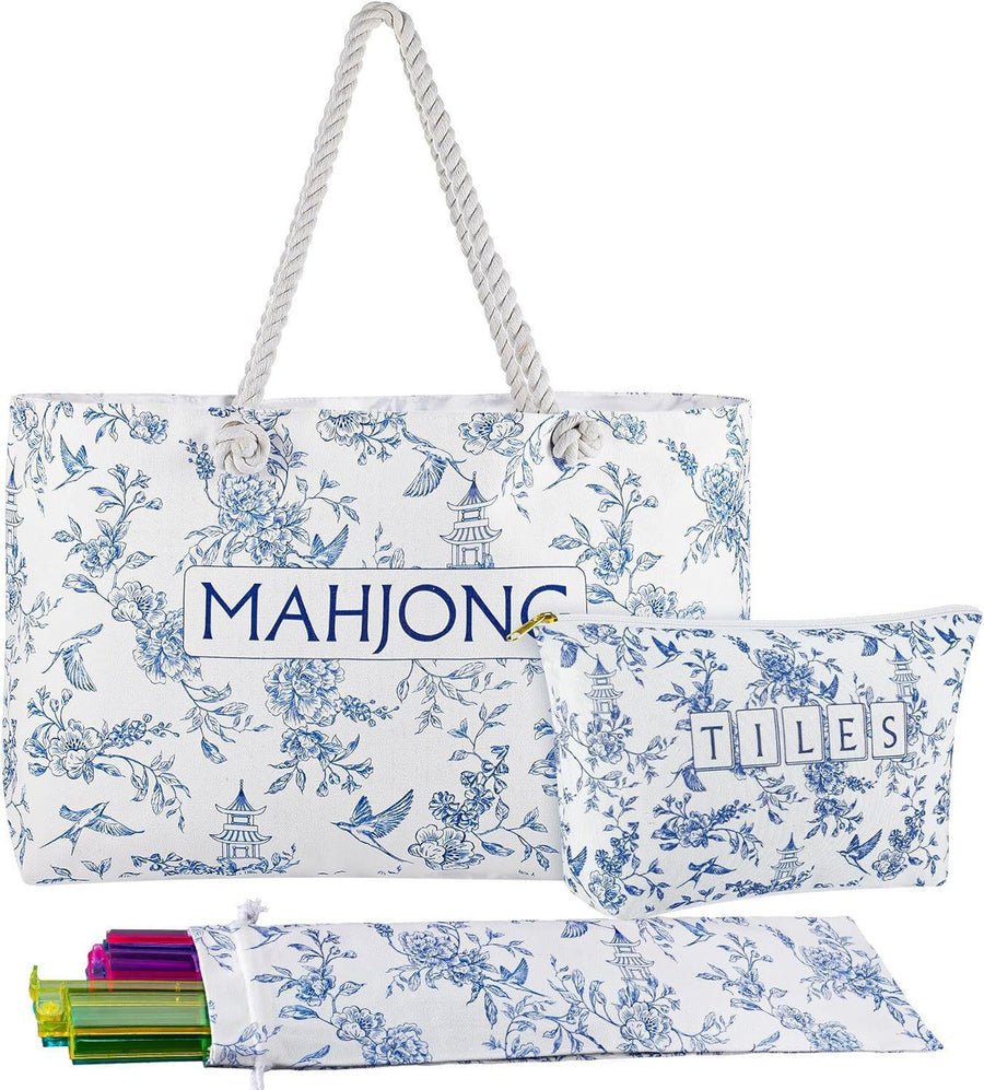 Peony Pavilion blue-and-white floral tote, tile pouch and long rack bag displayed together